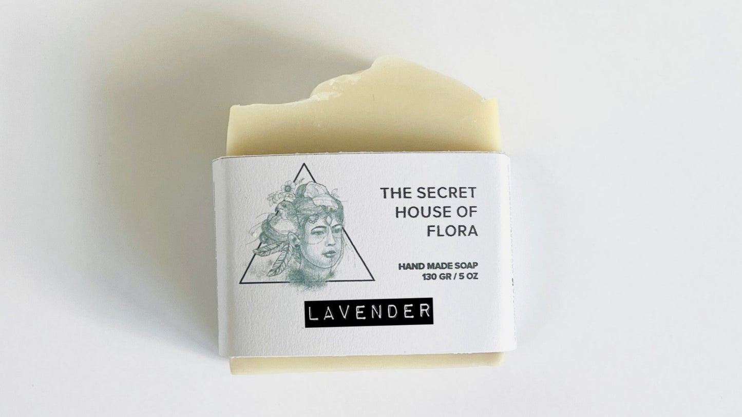 Bar of soap with a packaging label on a light background